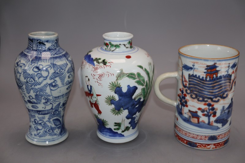 A Chinese famille verte wucai vase, a Chinese blue and white and an Imari mug, tallest 18cm